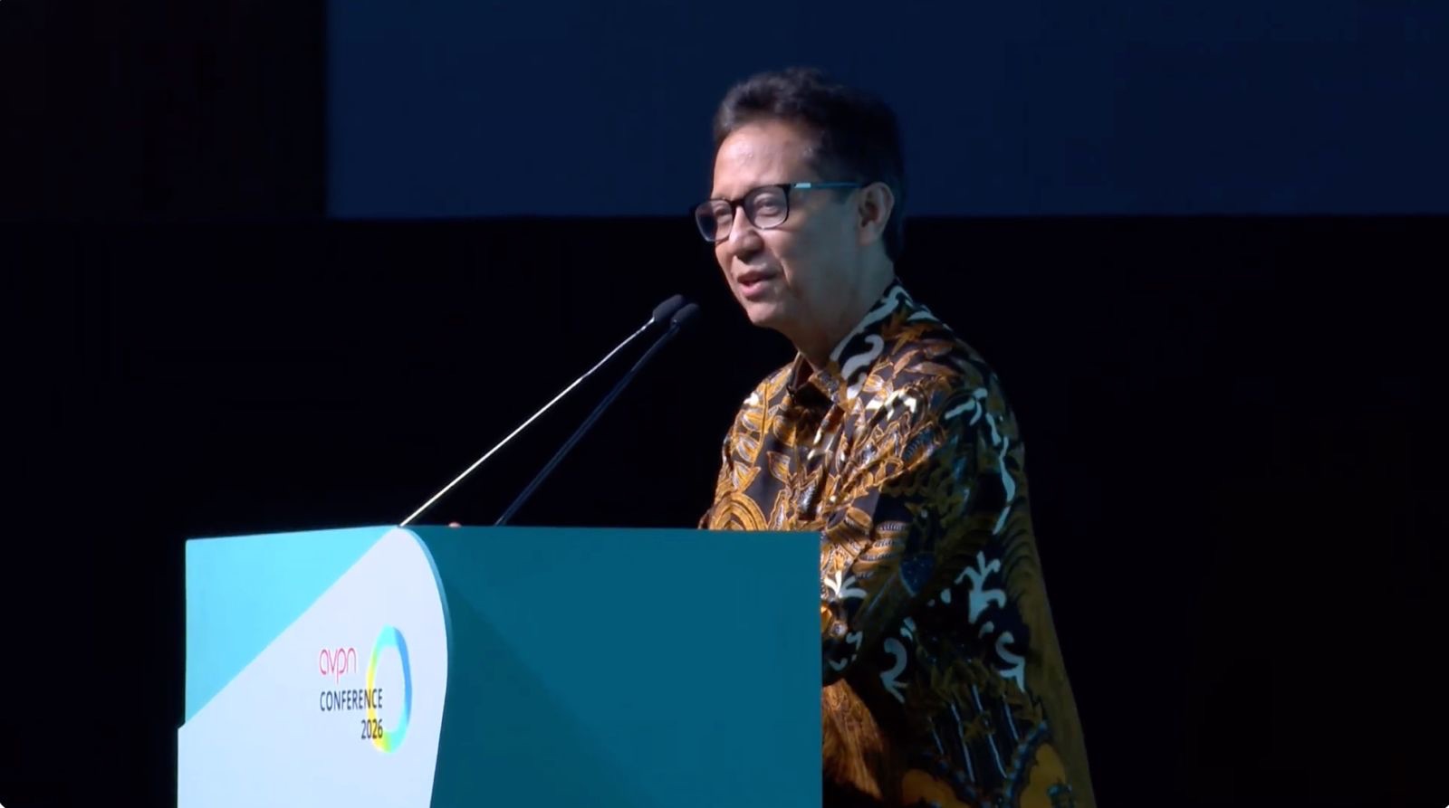 H.E. Budi Gunadi Sadikin speaking at the AVPN Conference 2026 podium